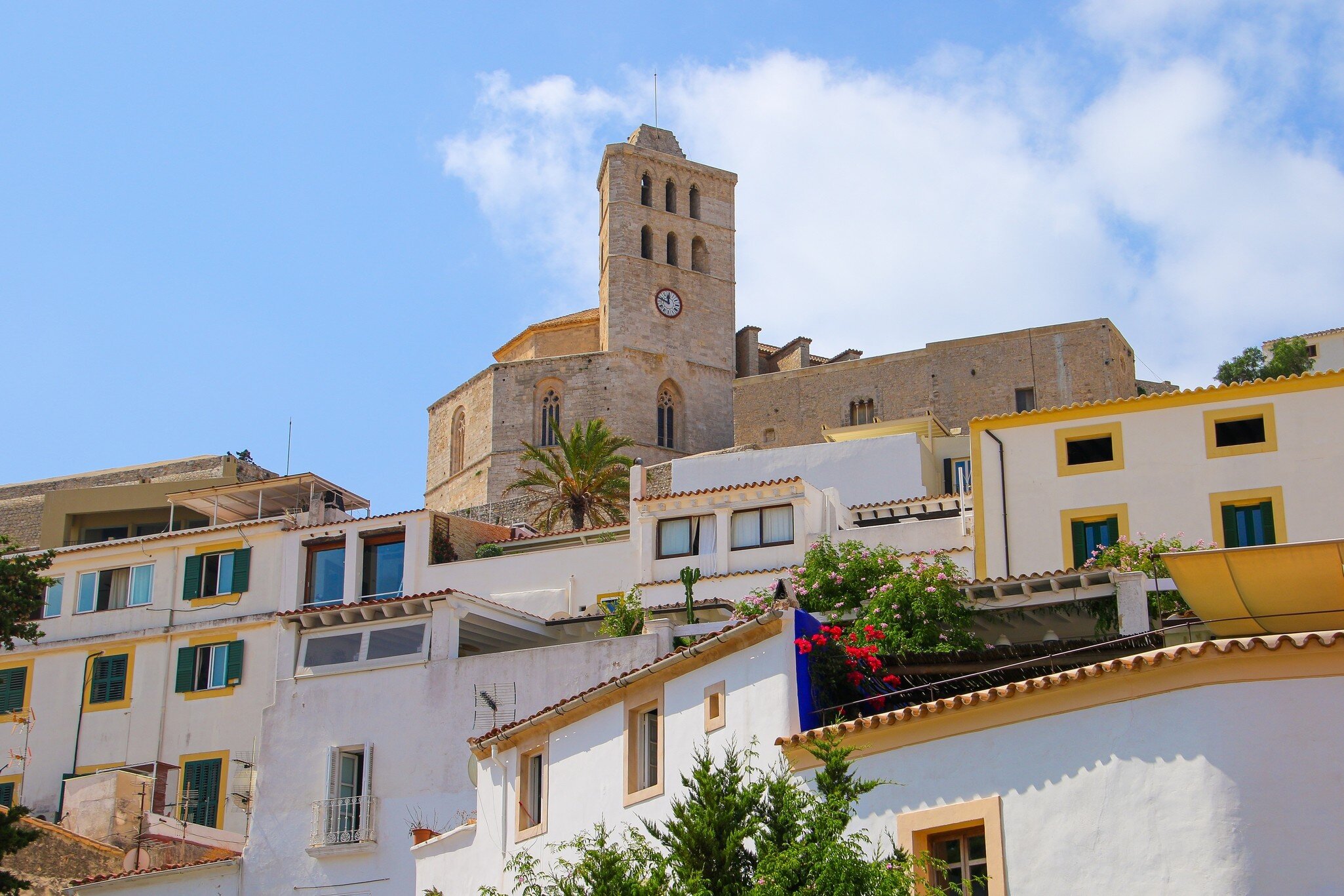 View of the Catedral de Santa Maria de les Neus on the top of the Castle of Eivissa in the old city center of Ibiza, Spain.