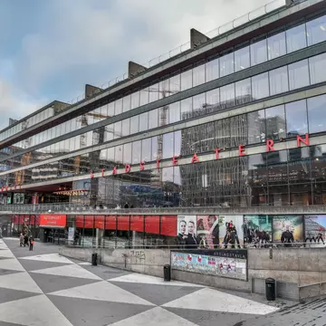 Stockholm, Sweden - November 22, 2018.  Exterior view of the House of Culture (Kulturhuset) in Stockholm, with billboards and people.