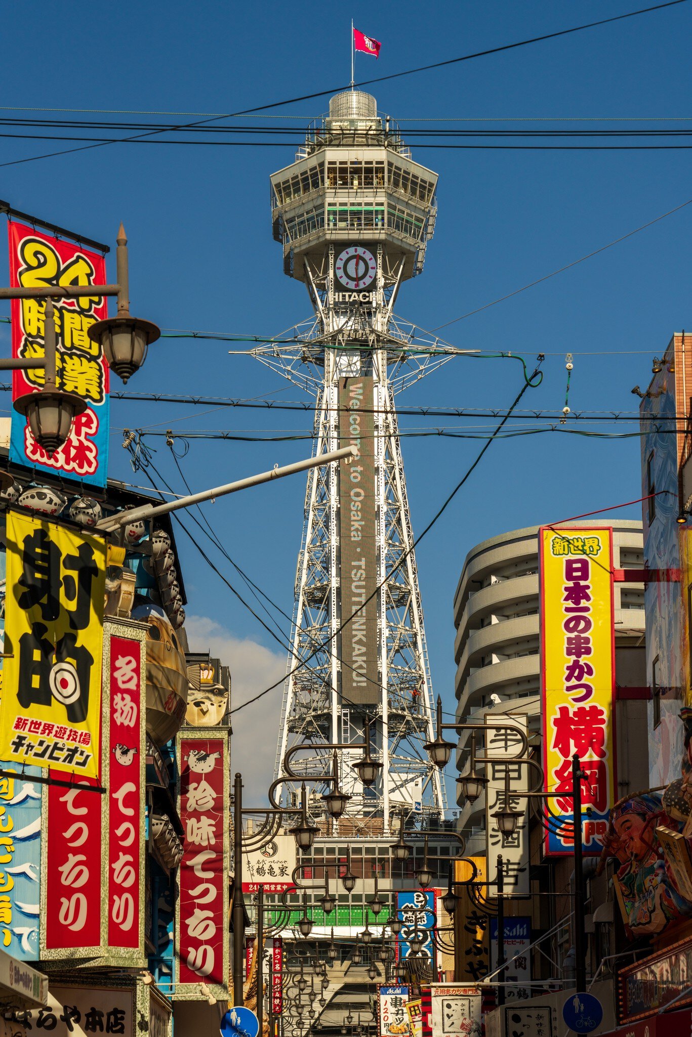 Osaka, Japan - December 29 2024: Osaka Shinsekai area and Tsutenkaku tower at daytime, License Type: media, Download Time: 2026-05-27T19:03:58.000Z, User: LP_NZhan, Editorial: true, purchase_order: 65050 - Digital Destinations and Articles, job: App Content, client: Lonely Planet, other: Nadine Zhan