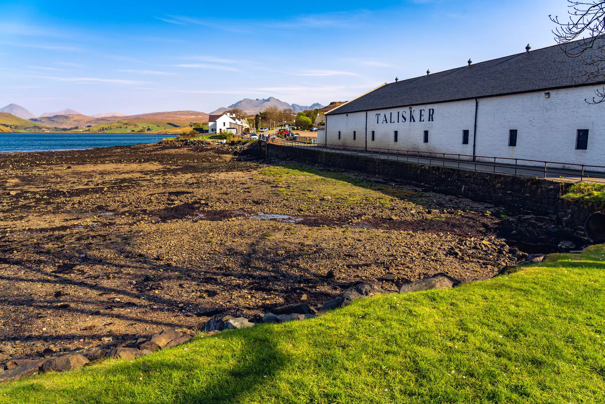 Talisker Distillery in the bay at Carbost, Isle of Skye, Scotland.