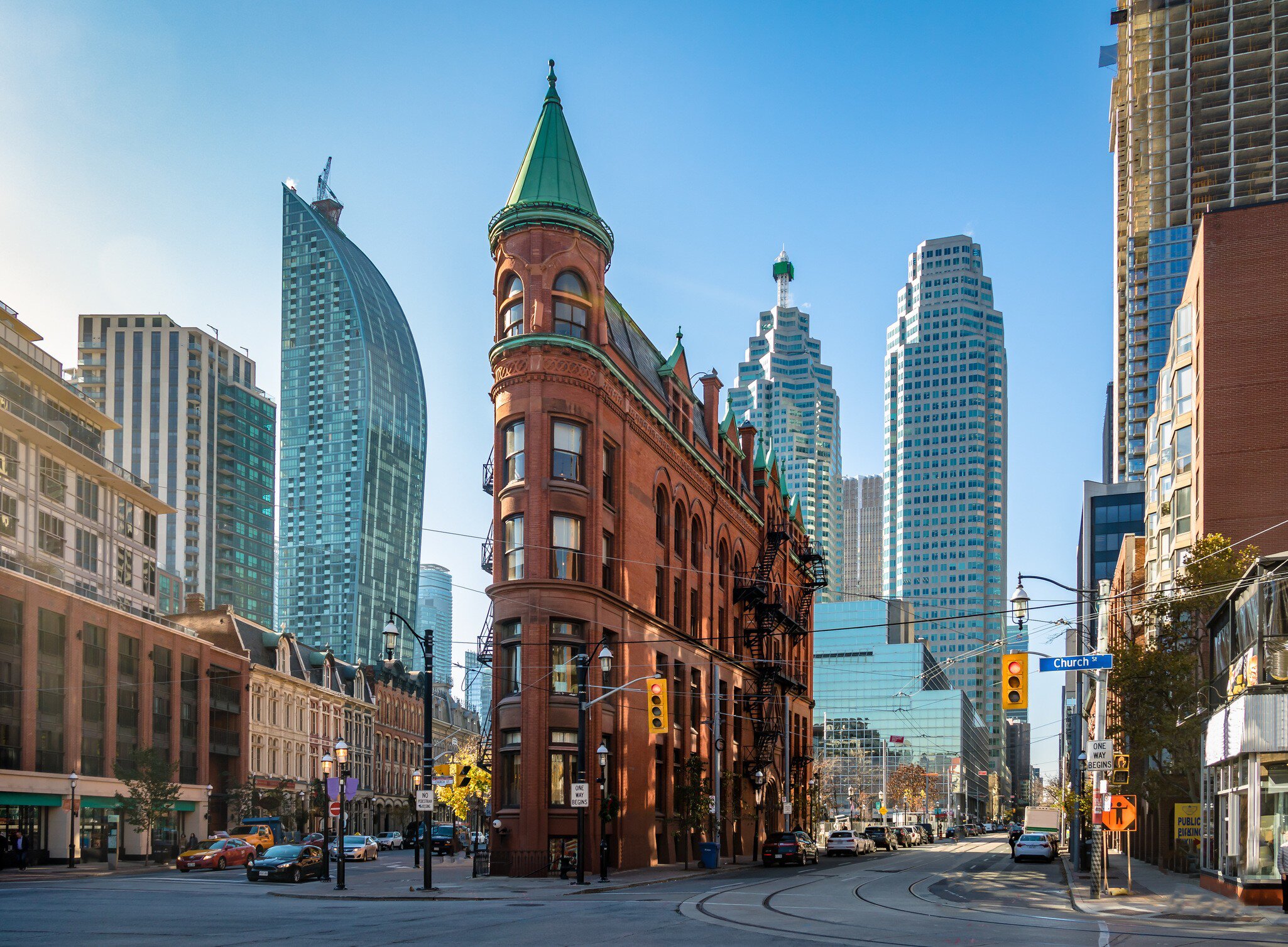 Exterior of the Gooderham or Flatiron Building in downtown Toronto, Canada on a sunny day.