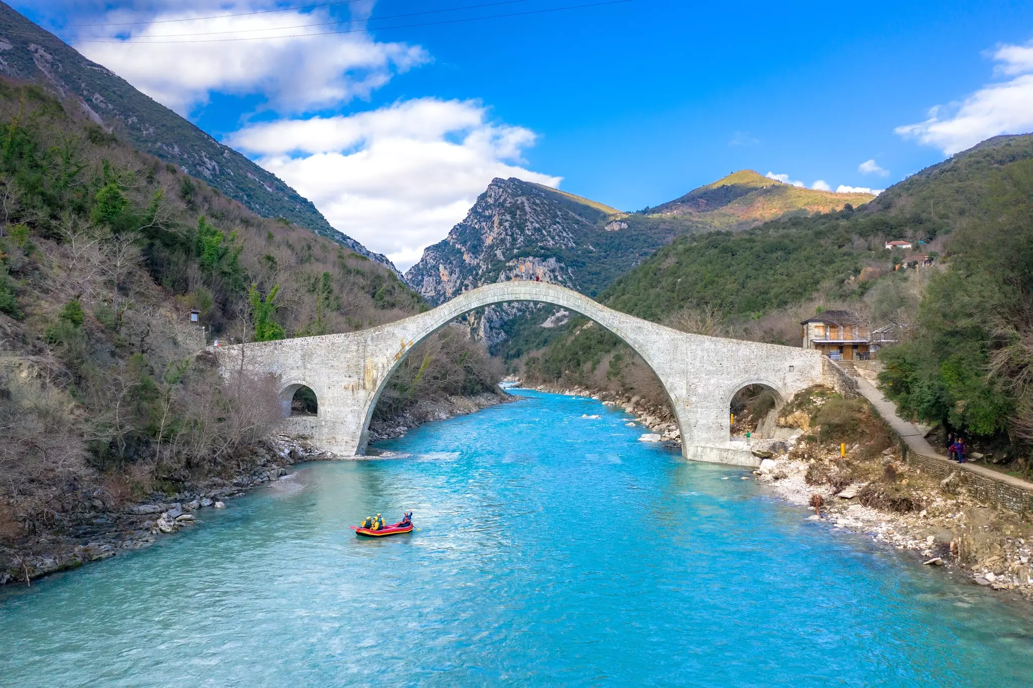 The great arched stone bridge of Plaka on Arachthos river, Tzoumerka, Greece.  License Type: media  Download Time: 2024-01-26T15:04:26.000Z  User: bhealy950  Is Editorial: No  purchase_order:   