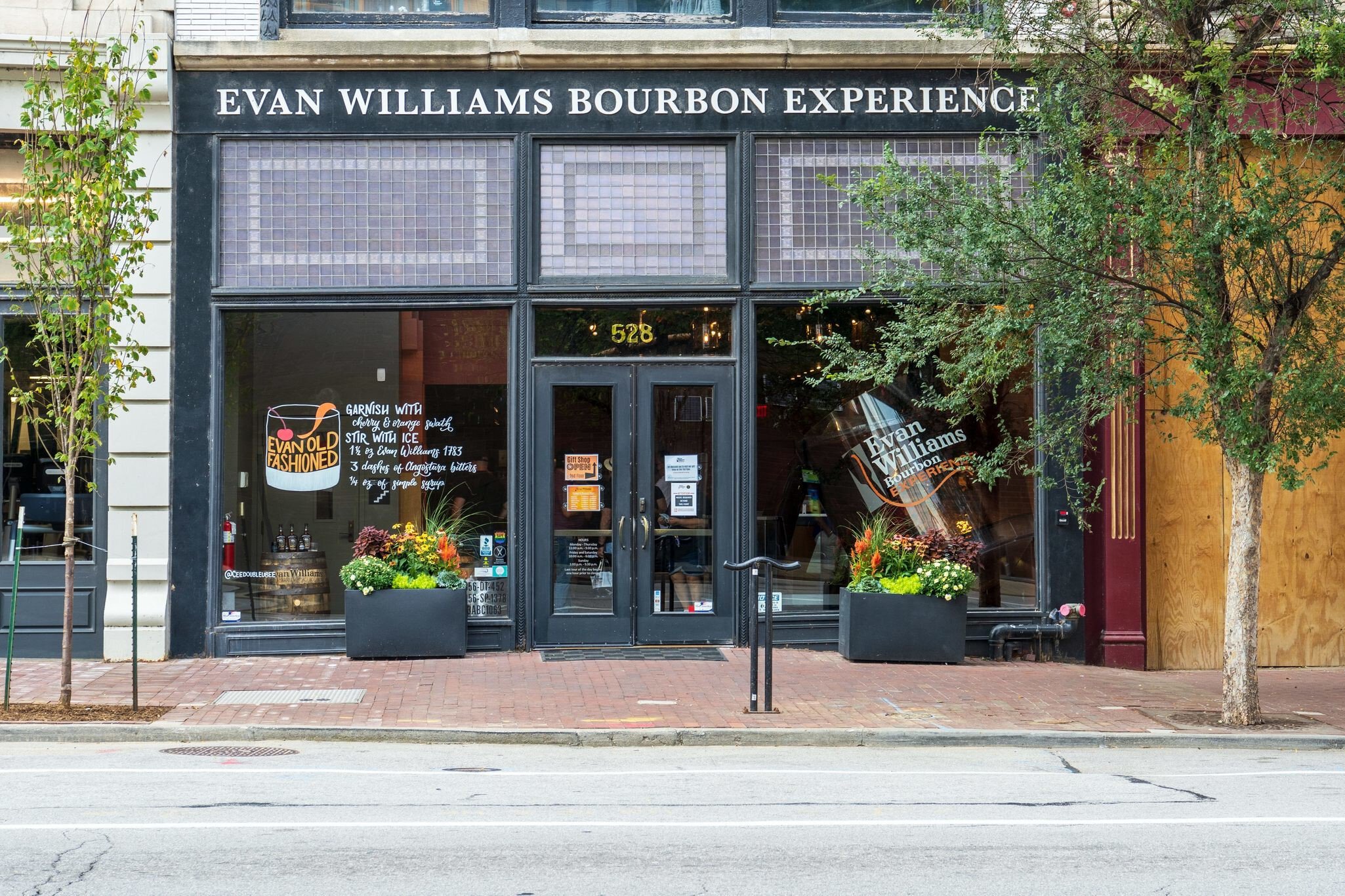 Louisville, KY - Sept. 11, 2021: Evan Williams Bourbon Experience on Whiskey Row is part of the Urban Bourbon Trail and features the world's largest rocks glass in their front window.; Shutterstock ID 2039952233; your: Bridget Brown; gl: 65050; ne...