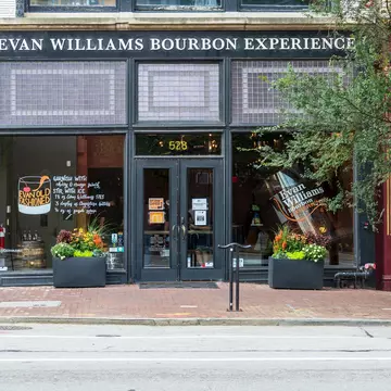 Louisville, KY - Sept. 11, 2021: Evan Williams Bourbon Experience on Whiskey Row is part of the Urban Bourbon Trail and features the world's largest rocks glass in their front window.; Shutterstock ID 2039952233; your: Bridget Brown; gl: 65050; ne...
