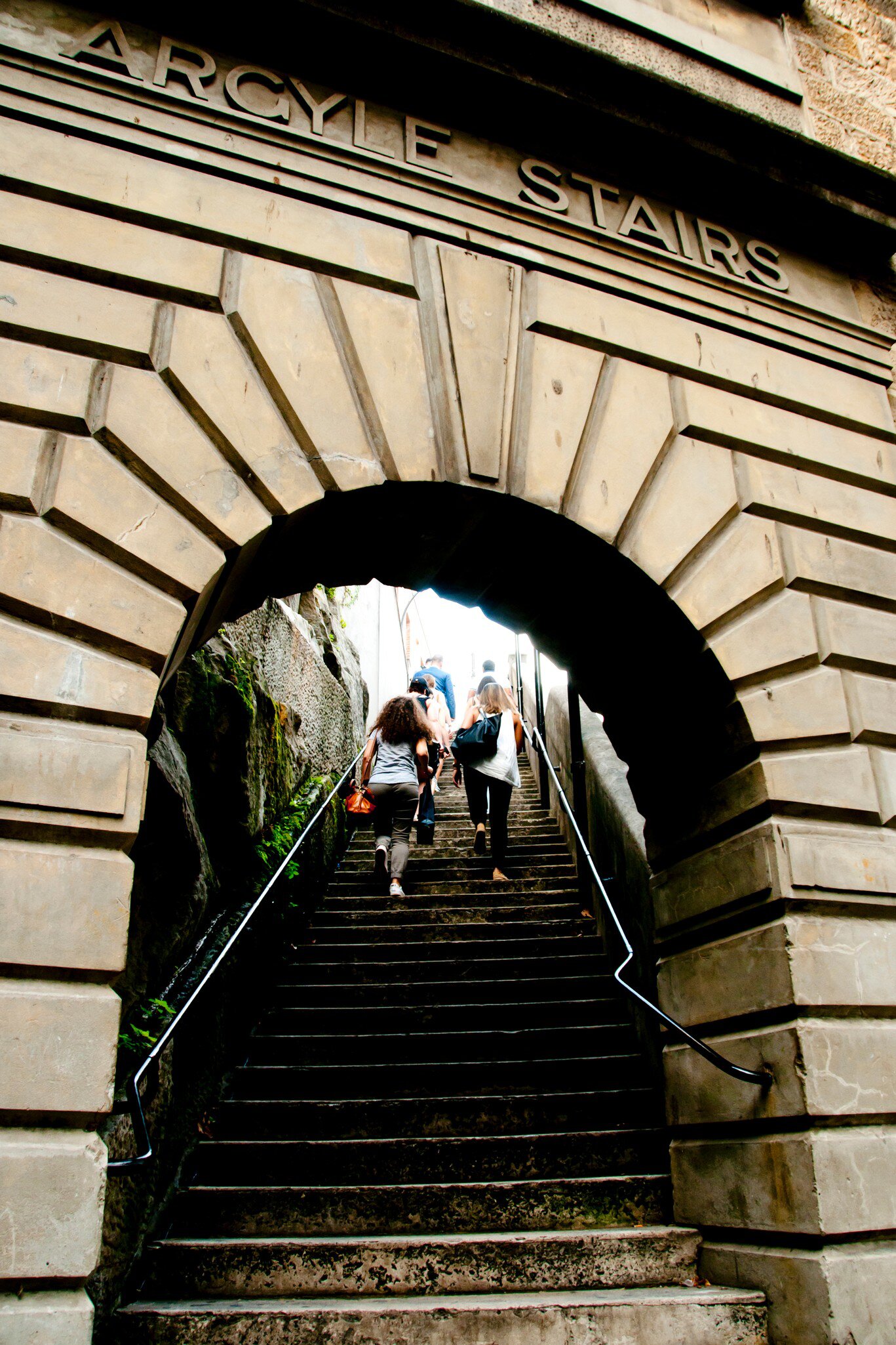 Walking up the Argyle Stairs, The Rocks, Sydney, Australia.