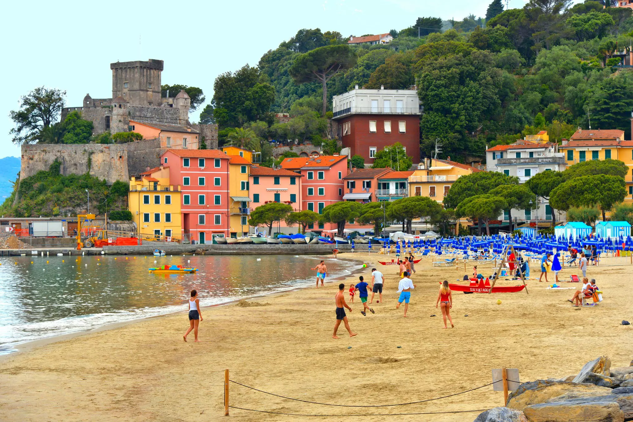 People on the beach in San Terenzo, Italy