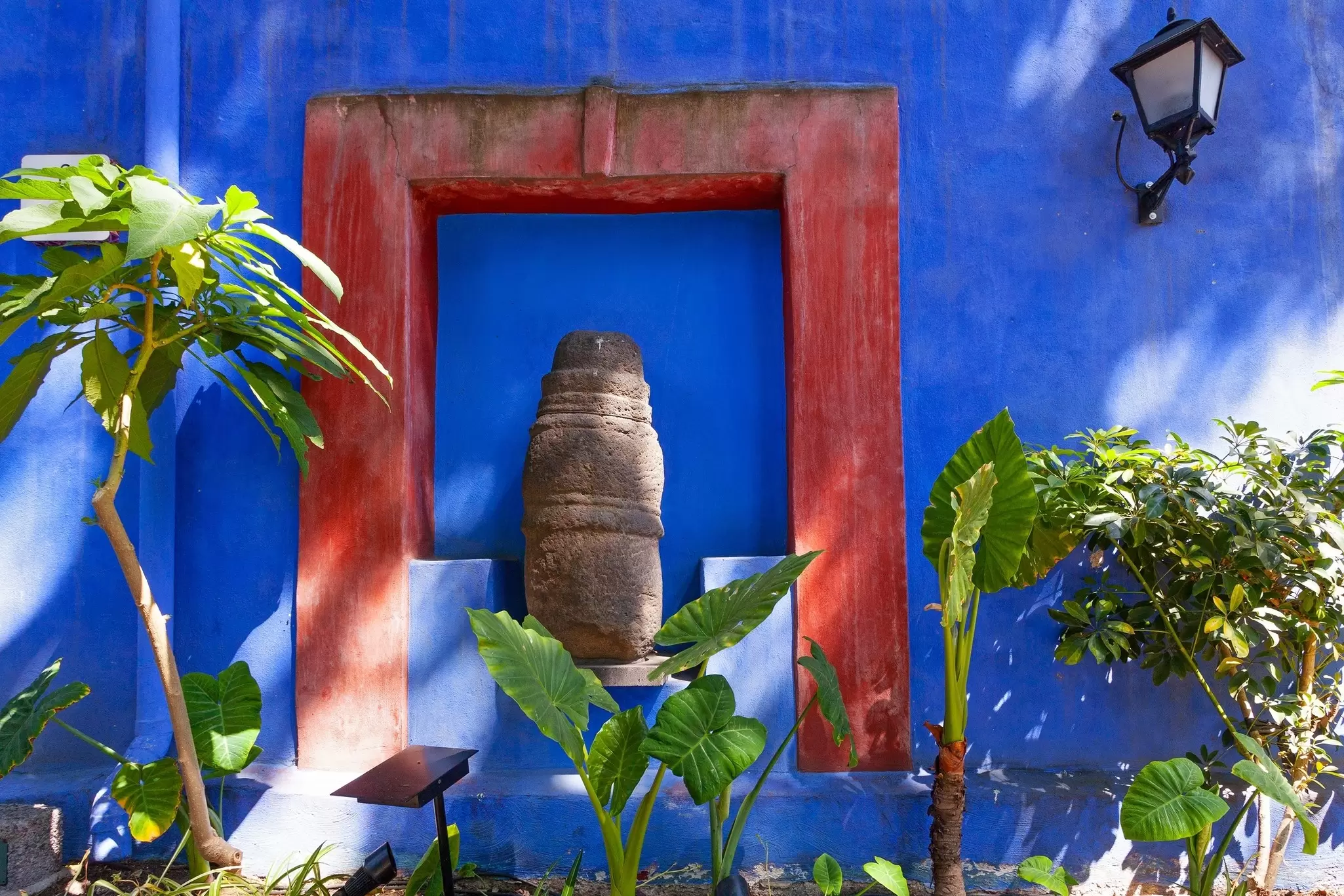 Blue House and courtyard of (La Casa Azul), historic house and art museum dedicated to the life and work of Mexican artist Frida Kahlo