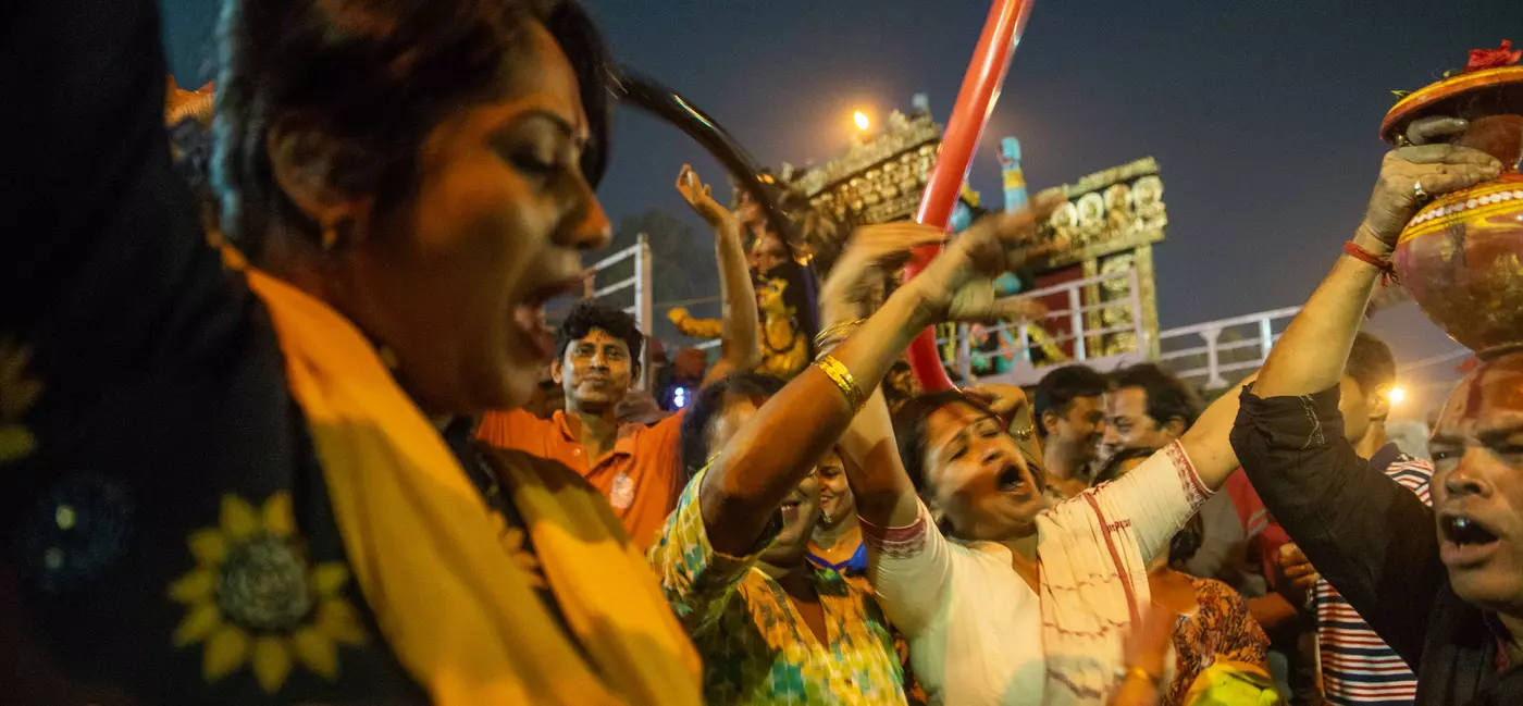 A group of people dancing and celebrating 
