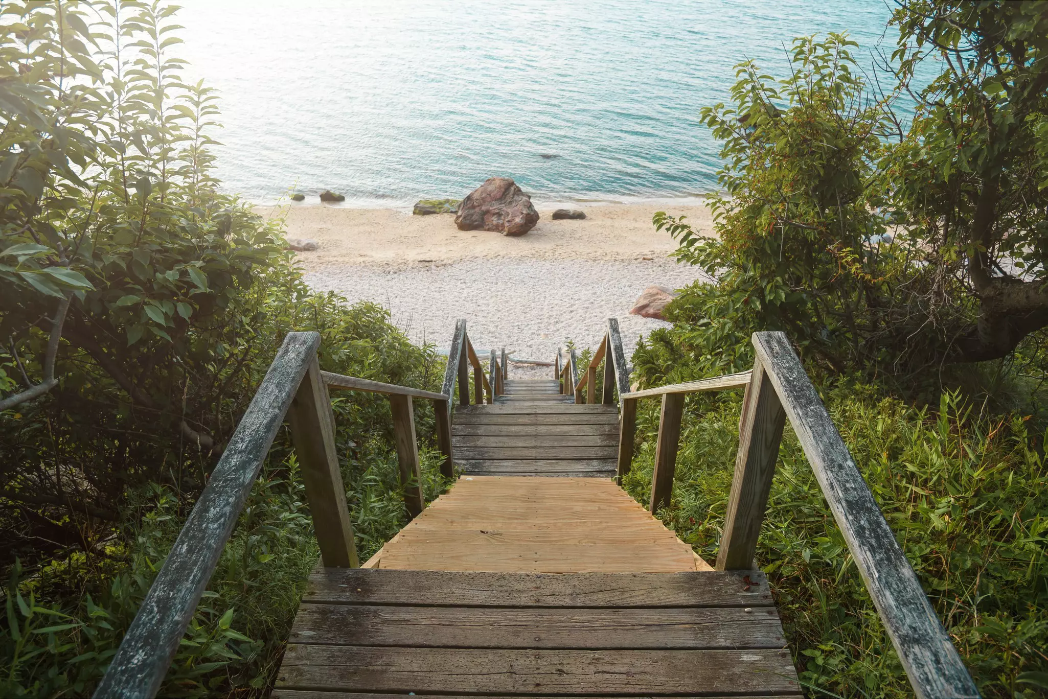 Stairs lead to a beautiful beach on the North Fork of Long Island. 
1191347068