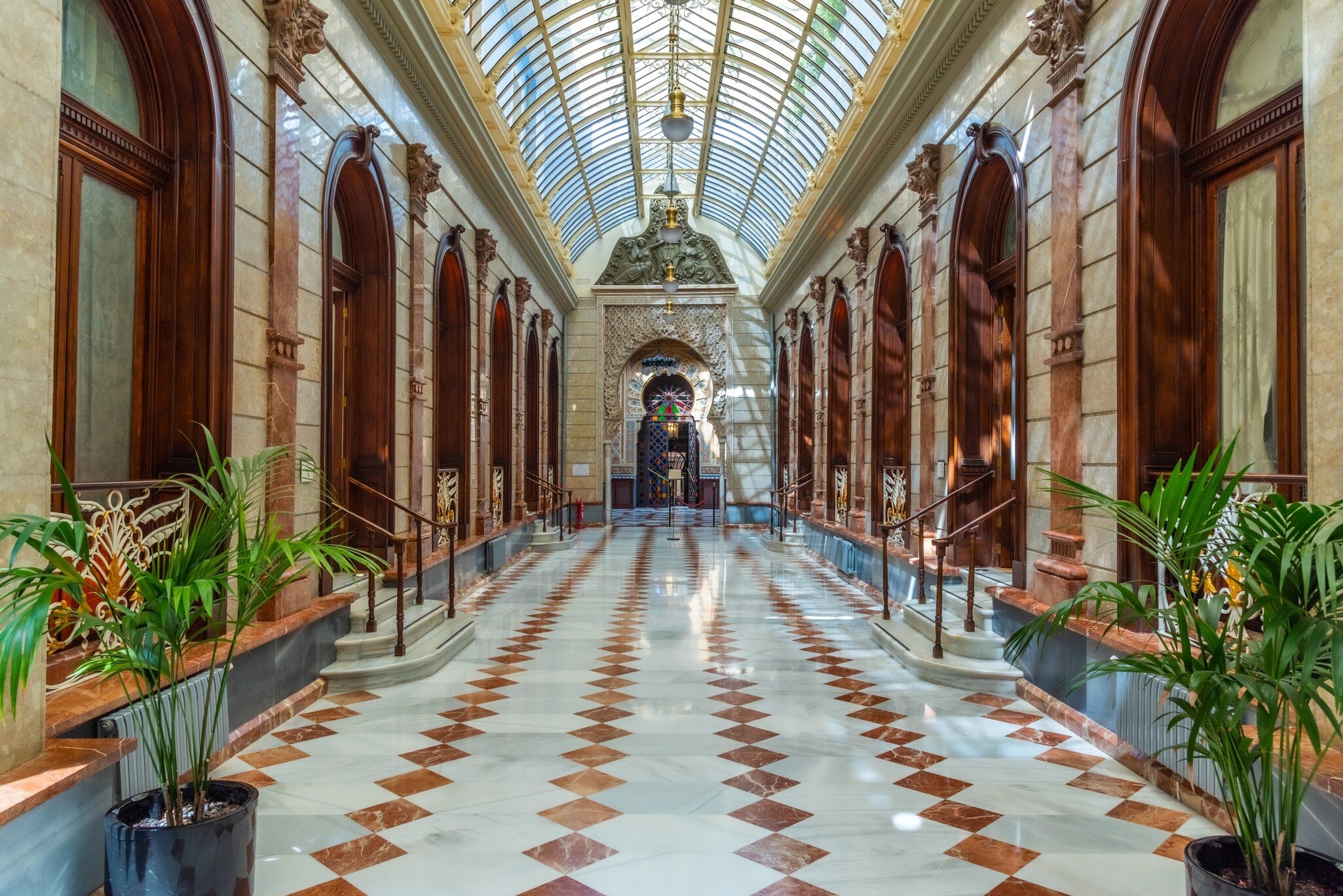 View down a hallway of the Real Casino de Murcia in Spain.