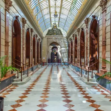 View down a hallway of the Real Casino de Murcia in Spain.