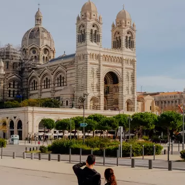 A couple looking towards the Marseille Cathedral in Marseille, France.