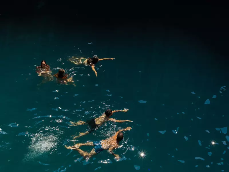 Swimmers at Fiordo di Furore on a summer's day. 