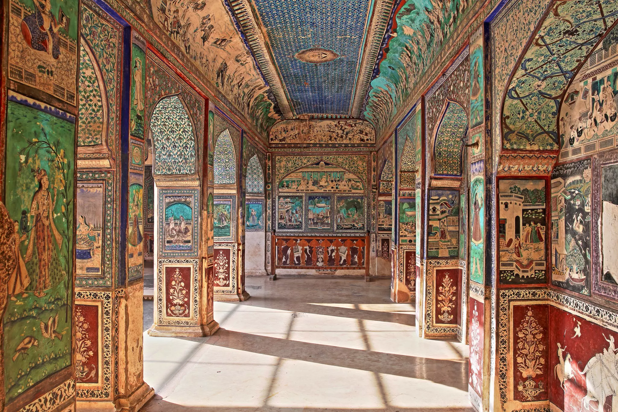 Intricate murals inside the Chitrasala palace at Bundi, Rajasthan.