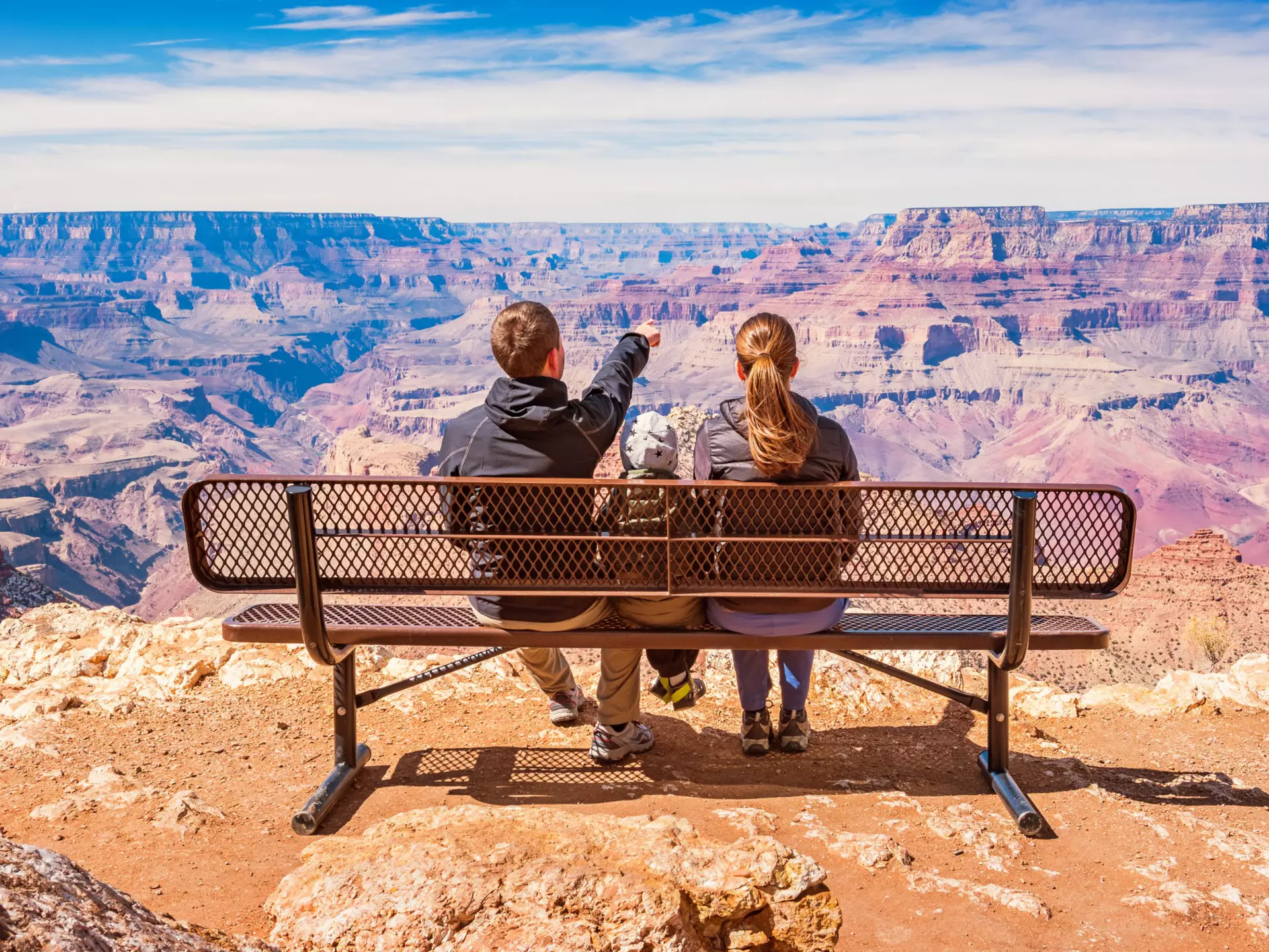 Family looking at view Grand Canyon National Park USA