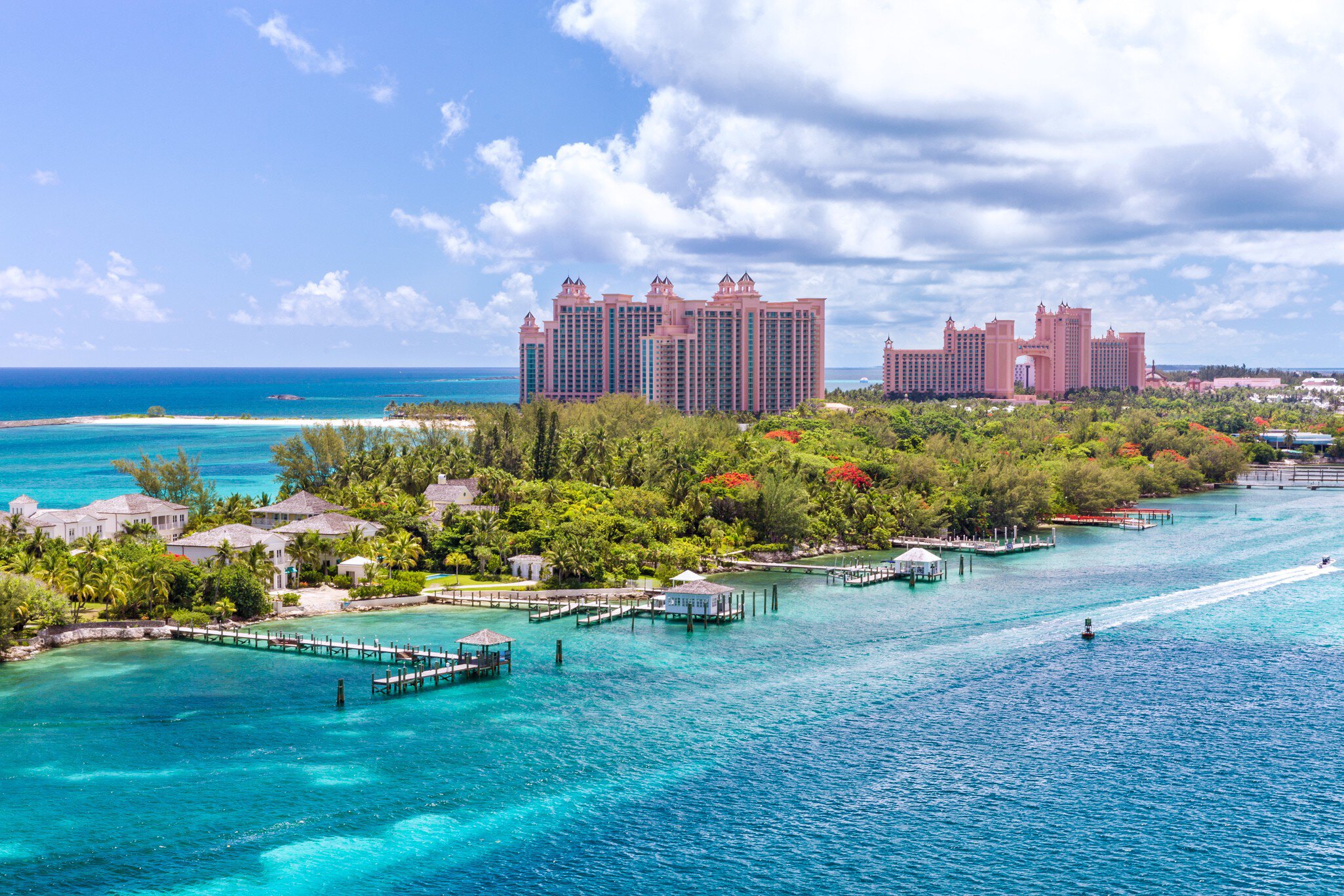 Paradise island with the Atlantis Resort at the background, Nassau, Bahamas Awesome Atlantis Resort on Paradise island in the island of Nassau, in the heart of the Caribbean sea in a sunny summer day.  License Type: media  Download Time: 2023-08-20T10:10:29.000Z  User: claramonitto  Is Editorial: No  purchase_order:   