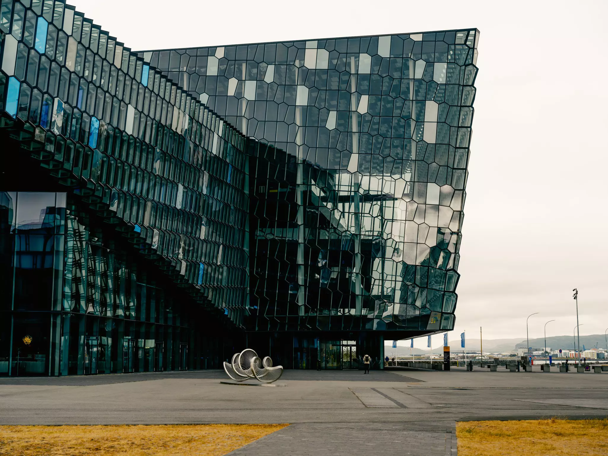 The glass frontage of the Harpa Concert Hall in Reykjavík, Iceland.