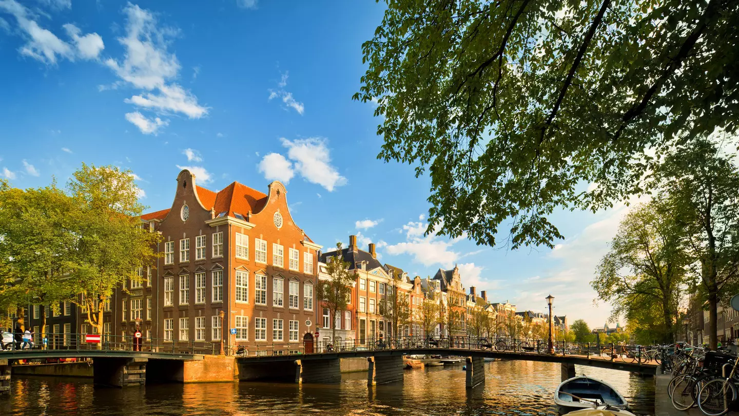 Amsterdam's beloved canals may appear pristine on the surface, but there is plenty of work to be done to clean them up © Nikada / Getty Images