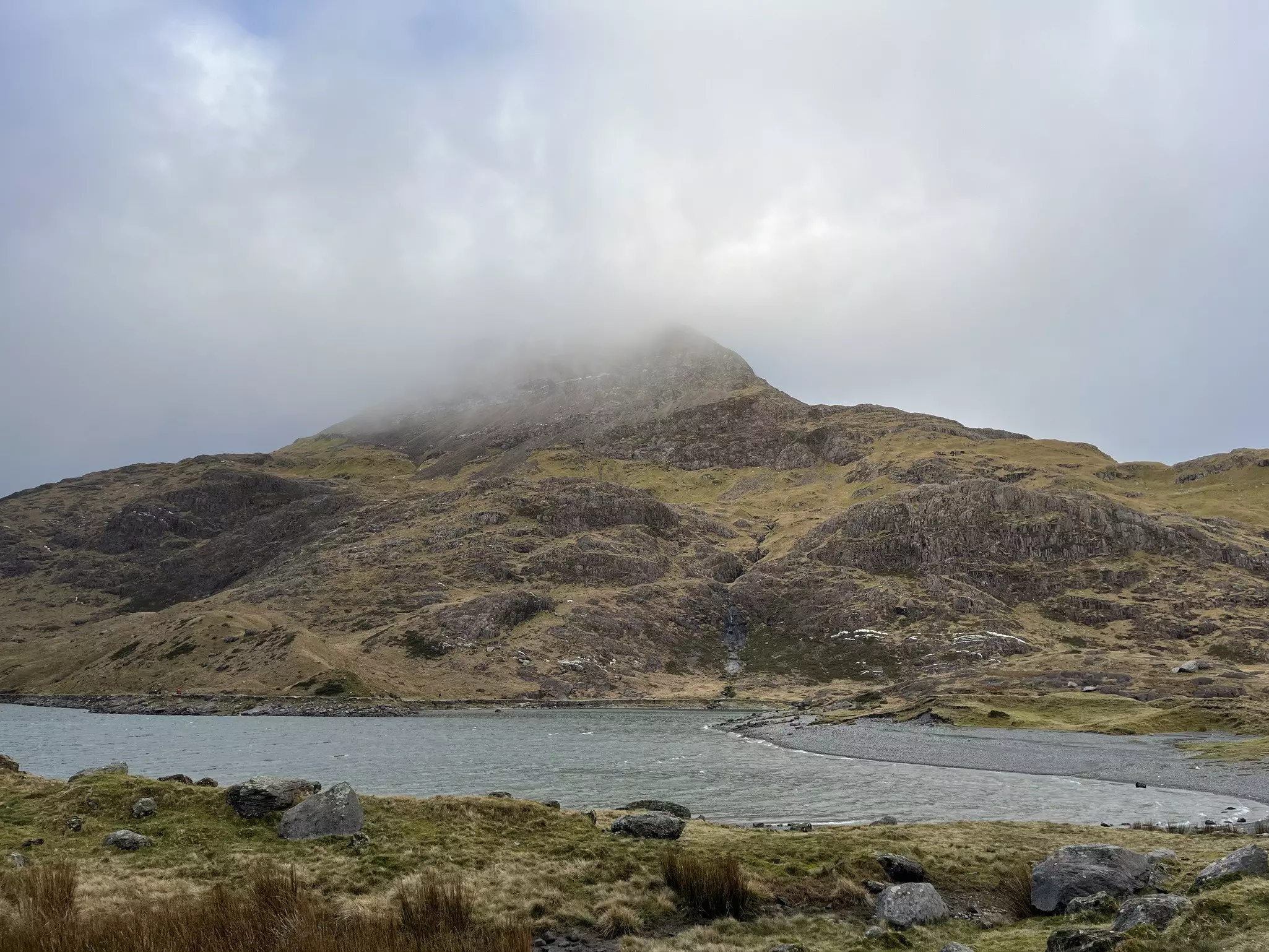 The glacial lake of Llyn Llydaw in Eryri (Snowdonia) National Park in Wales in winter Tasmin Waby for Lonely Planet