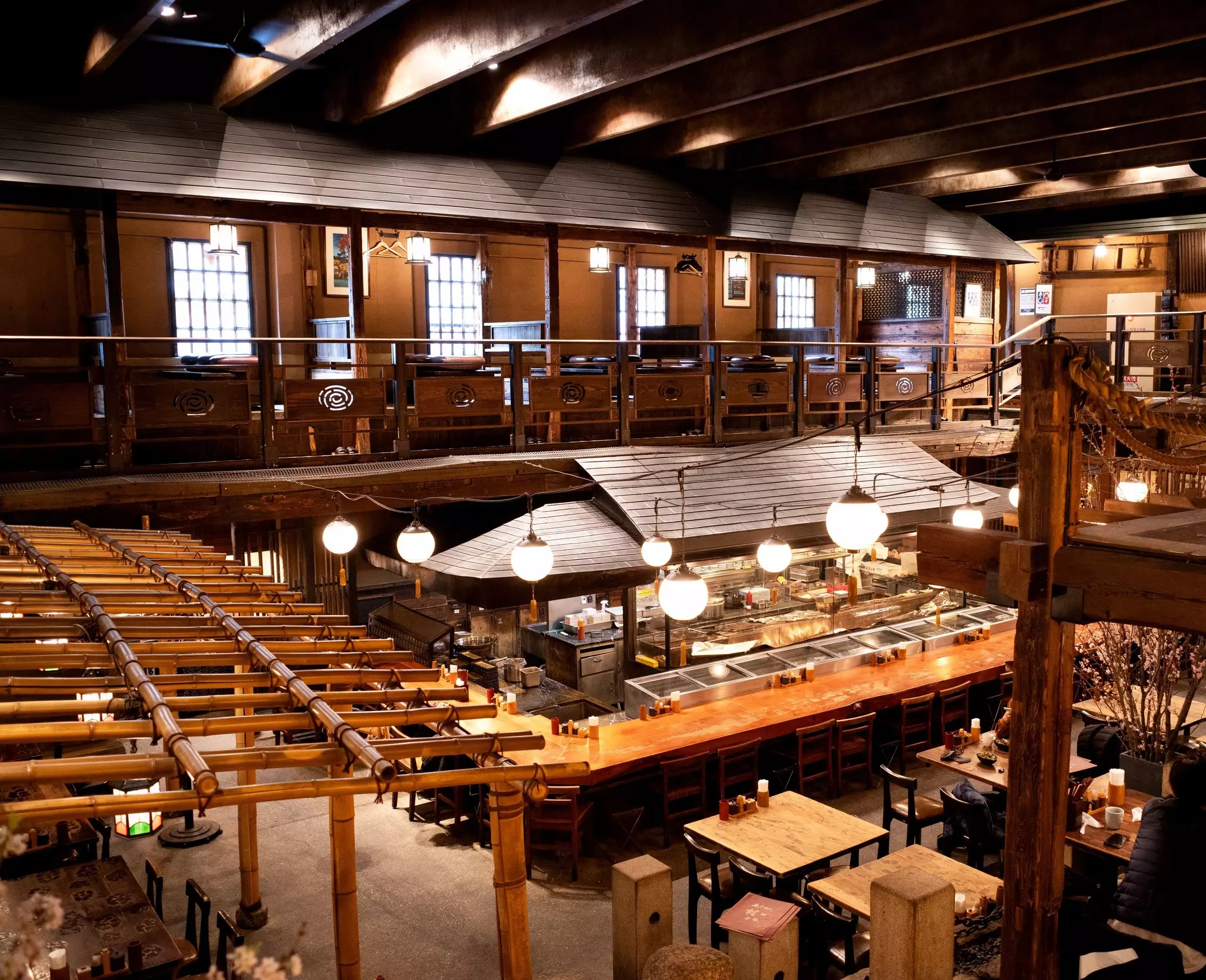 A wide view of the dining room of a large restaurant.