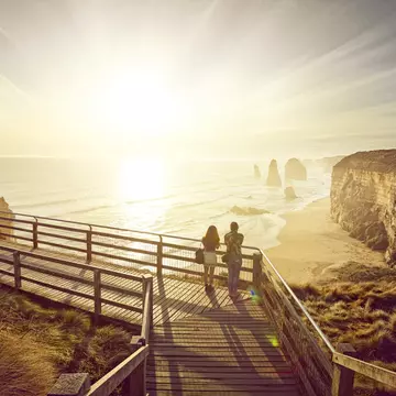 two tourists looking at the 12 apostles on the great ocean road, Australia, at sunset
616116311
travel, adventure, explore, summer, tourism