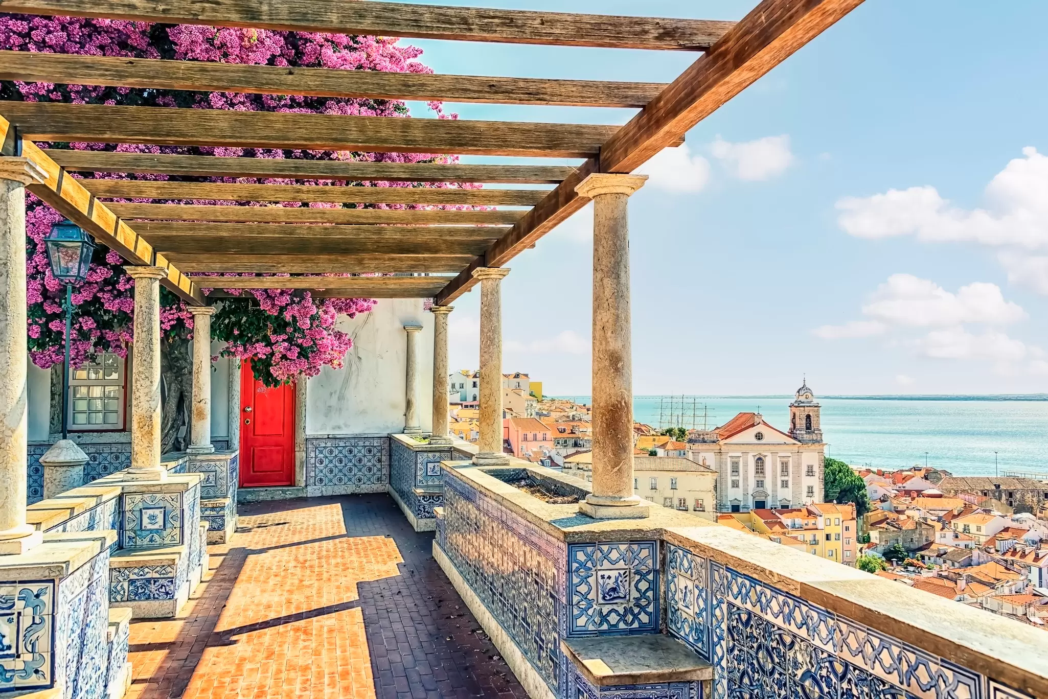 After exploring Lisbon, why not take your time getting to Madrid and have some adventures on the way © Getty Images