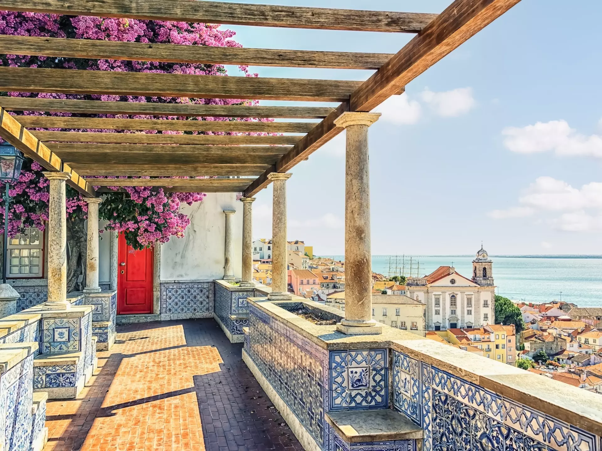 After exploring Lisbon, why not take your time getting to Madrid and have some adventures on the way © Getty Images