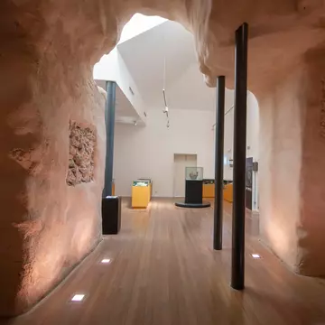 View down a hallway at the Núcleo Museológico Islâmico in Tavira, Portugal.