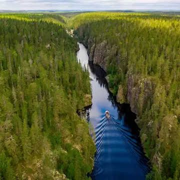 Aerial view of a boat, canyon lake and forest in Julma-Ölkky, Hossa National Park, Finland; Shutterstock ID 2023369706; purchase_order: 65050; job: ; client: ; other: