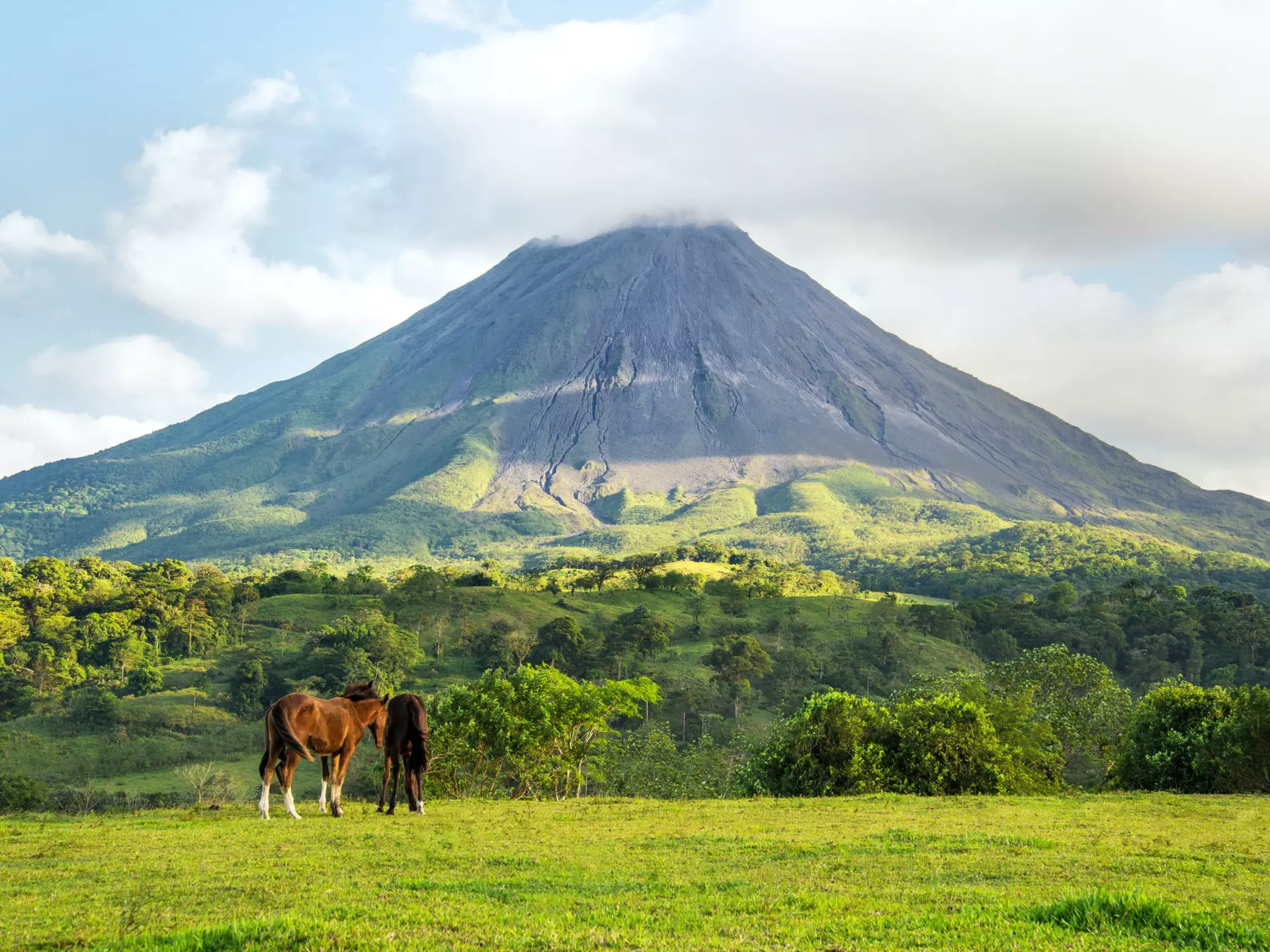 Arenal volcano landscape on a sunny day.