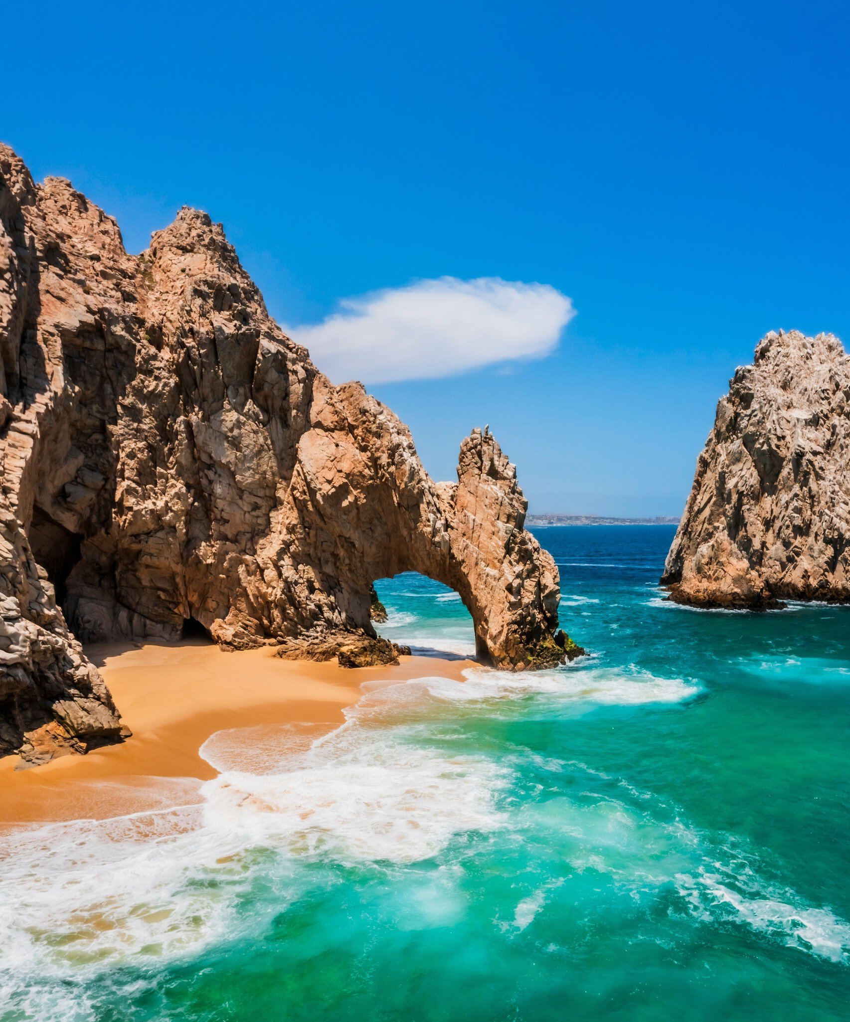 View of the Cabo San Lucas Arch, an iconic rock formation at the southern tip of Cabo San Lucas in Mexico.