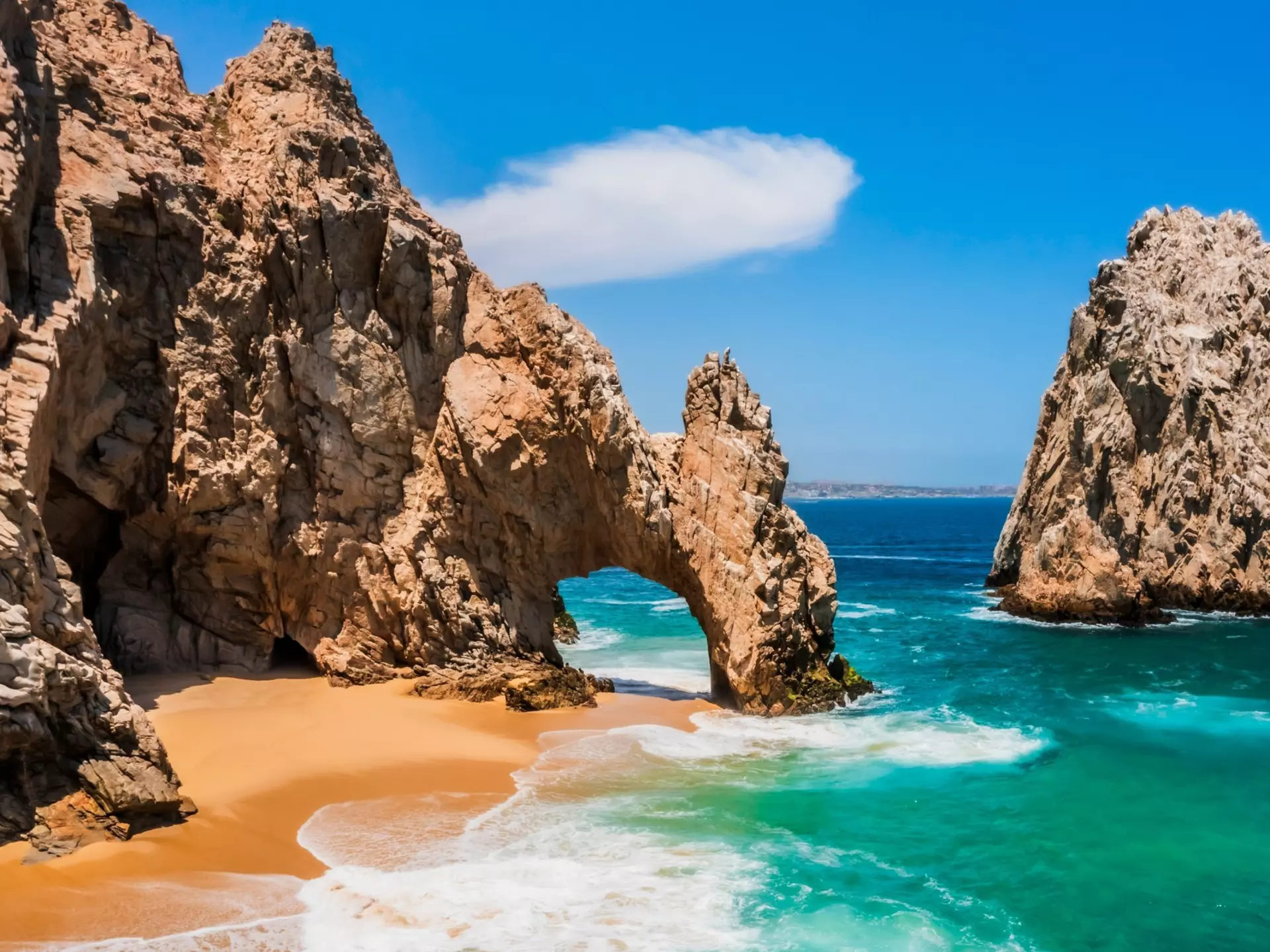 View of the Cabo San Lucas Arch, an iconic rock formation at the southern tip of Cabo San Lucas in Mexico.