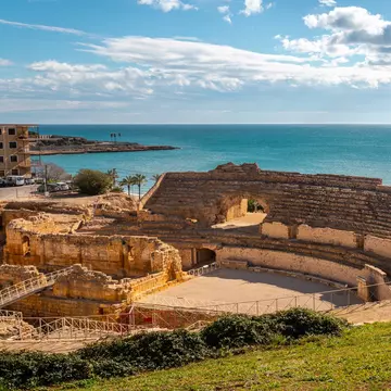The spectacular ancient Roman amphitheater dates back to the 2nd century and was once a stage for gladiators. Shutterstock