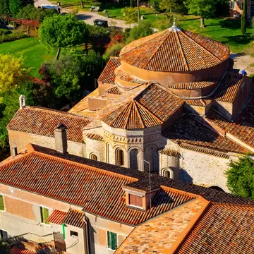 Aerial view of Santa Maria di Assunta cathedral on Torcello island in Venice lagoon, Italy