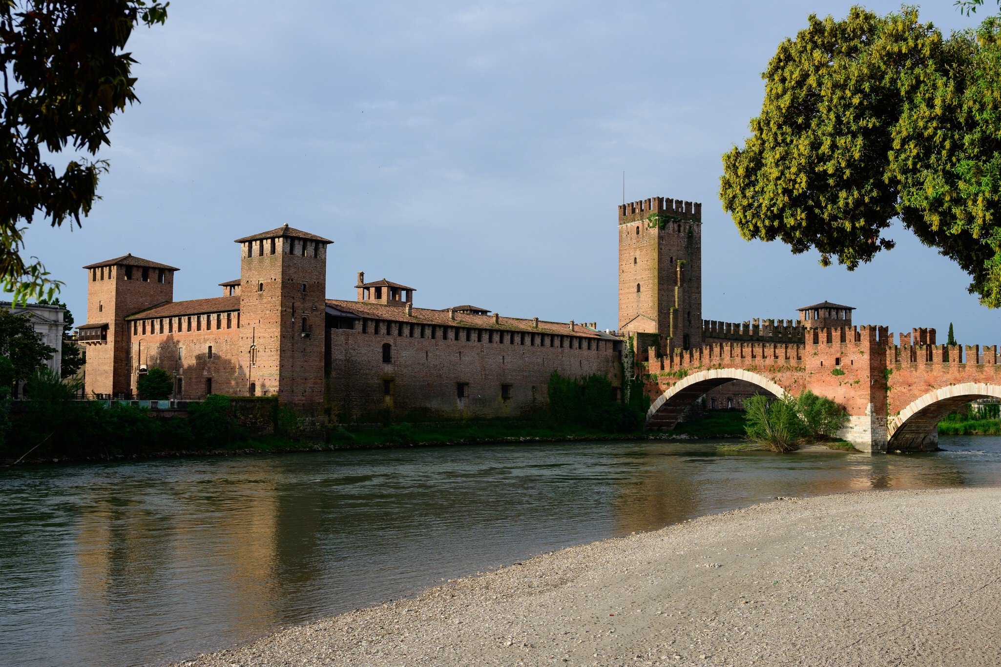 Castelvecchio Old Castle in Verona with Ponte di Castel Vecchio Bridge over the Adige River in Verona, Italy.