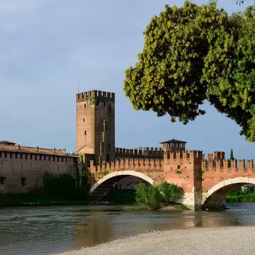 Castelvecchio Old Castle in Verona with Ponte di Castel Vecchio Bridge over the Adige River in Verona, Italy.
