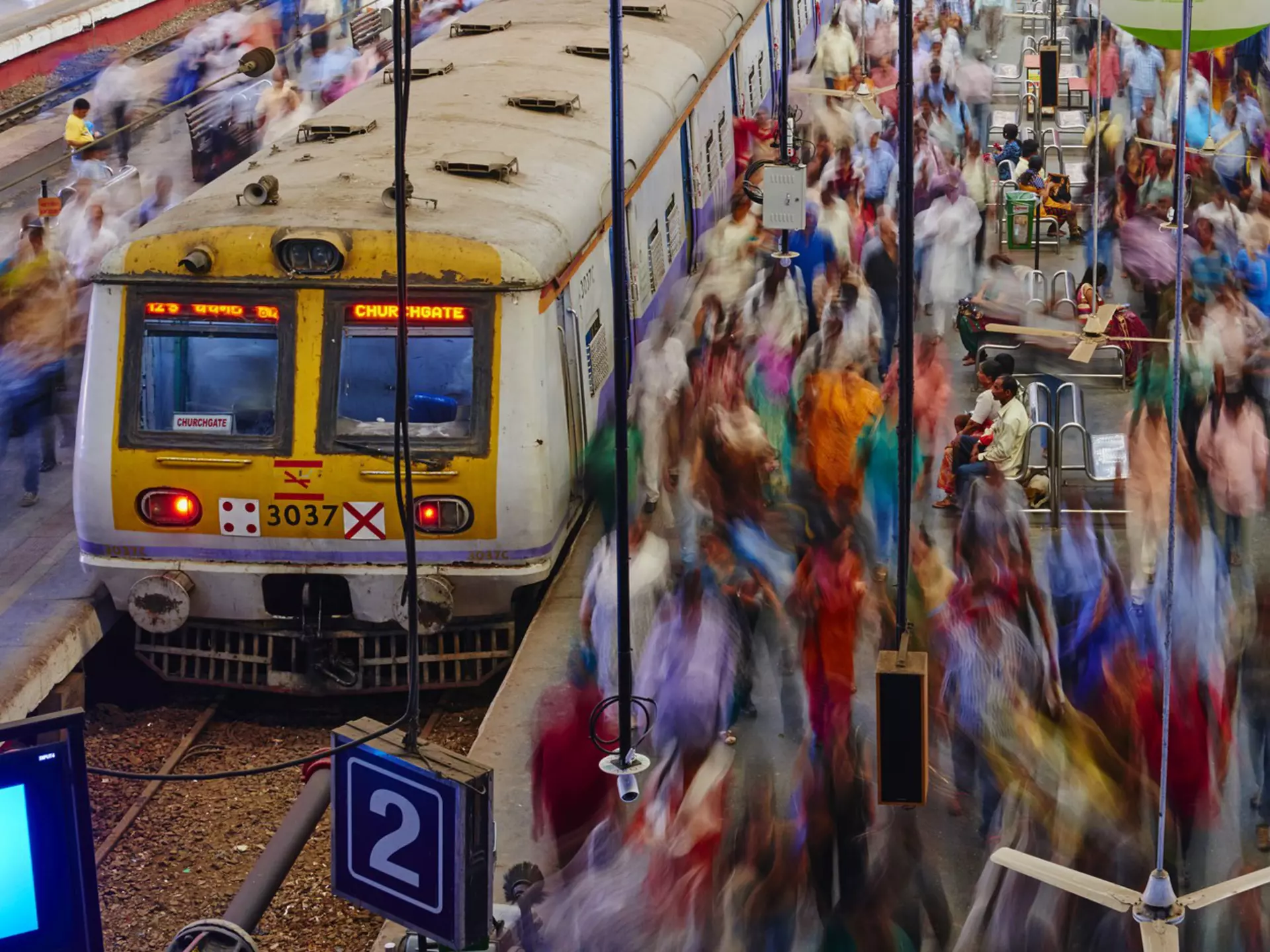 Passengers board trains at Mumbai's Chhatrapati Shivaji Maharaj Terminus.