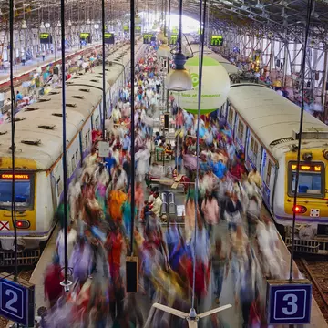 Passengers board trains at Mumbai's Chhatrapati Shivaji Maharaj Terminus.