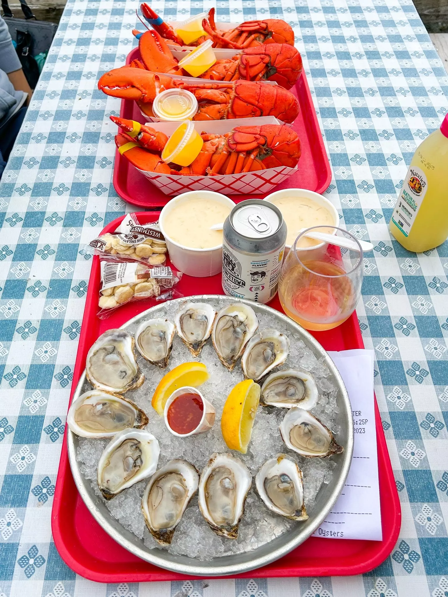 Onder a seafood sampler and try New England-style oysters, clam chowder and lobster with friends. paikong/Shutterstock