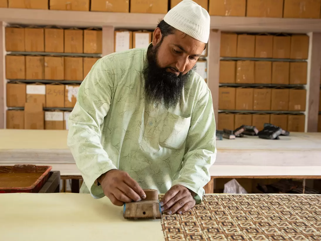 Block-printing process at the Sufiyan Ajrakh Studio in Gujarat, India. 