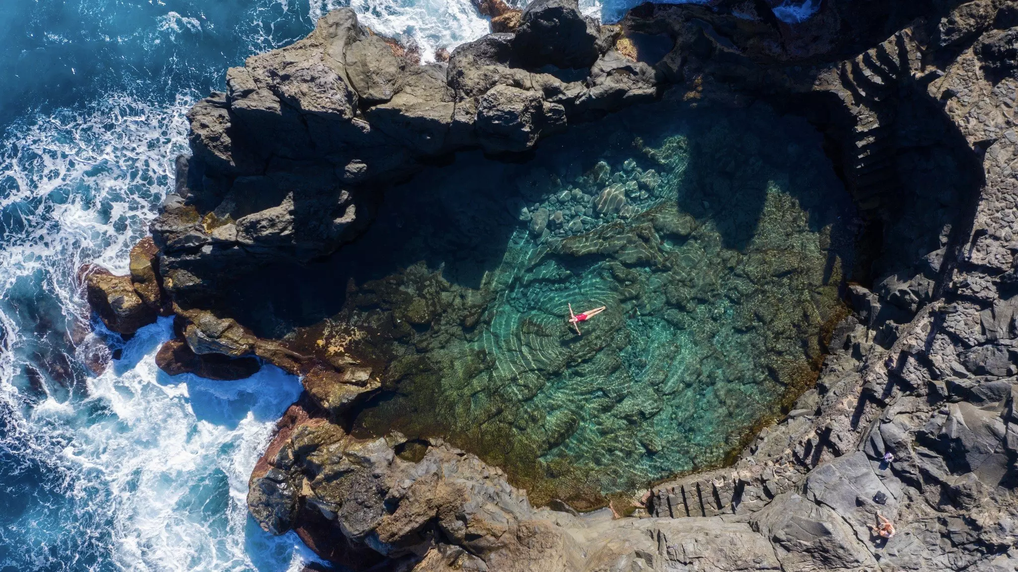 Swims in tidal pools, hikes through dormant volcanoes, visits to historic towns and more: here’s what you’ll want to do on the enchanting Canary Islands. Shutterstock