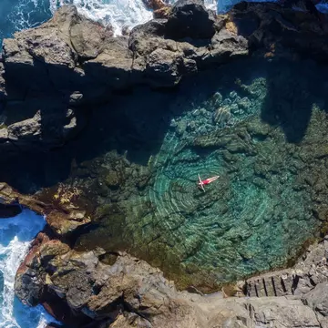 Swims in tidal pools, hikes through dormant volcanoes, visits to historic towns and more: here’s what you’ll want to do on the enchanting Canary Islands. Shutterstock