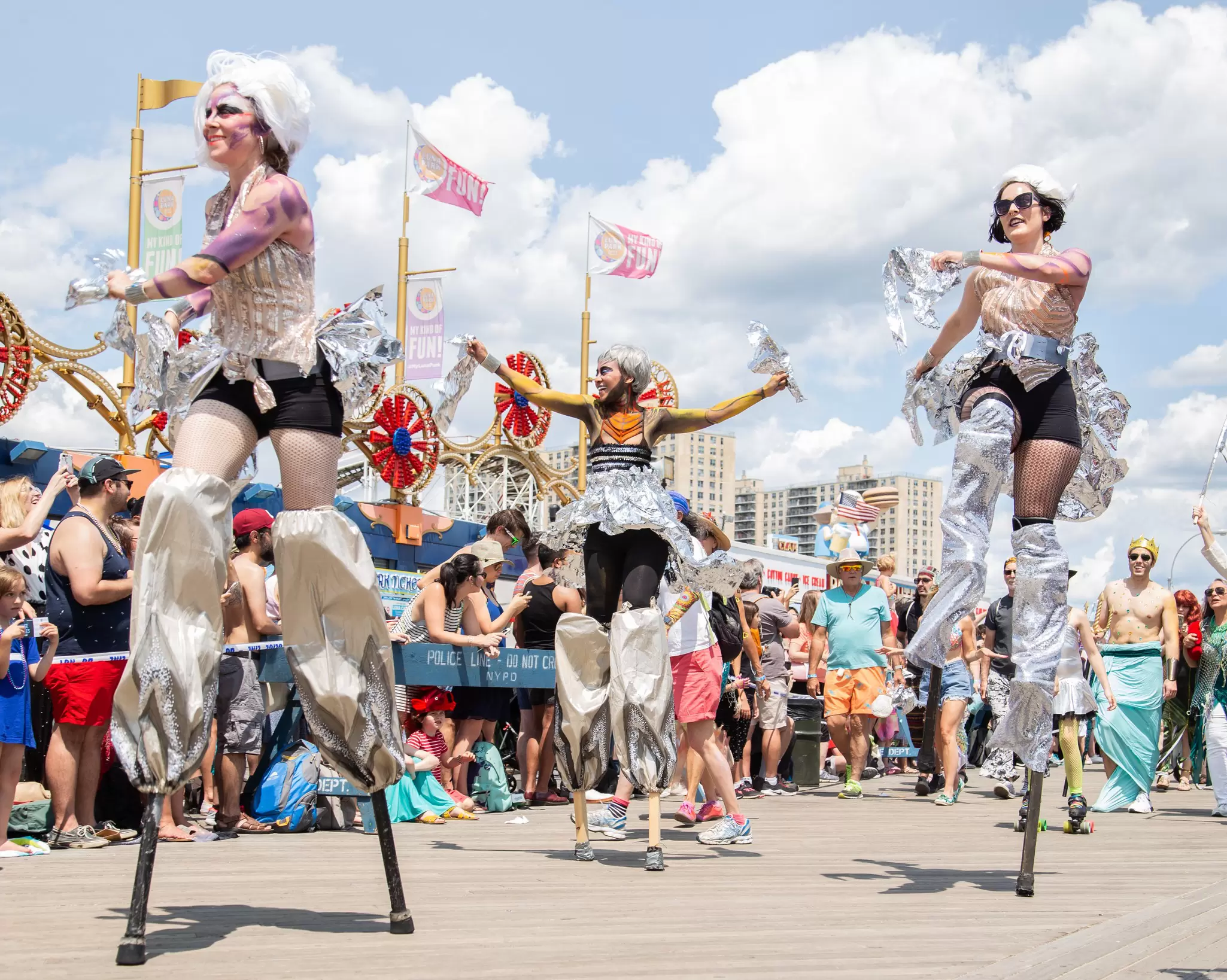 People gather to watch the Mermaid Parade on Coney Island, Brooklyn.