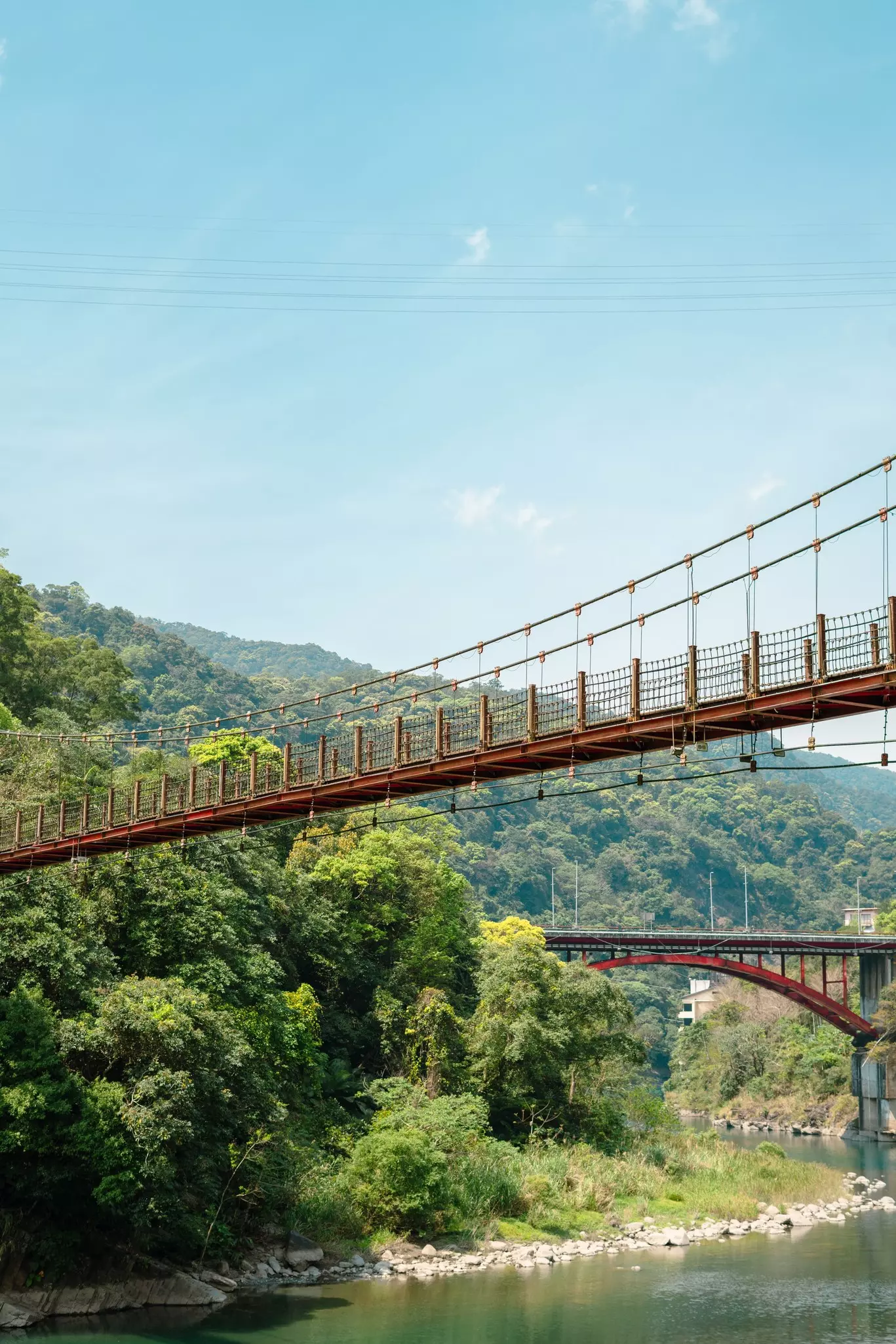 Wulai district green forest and river bridge in New Taipei City, Taiwan.