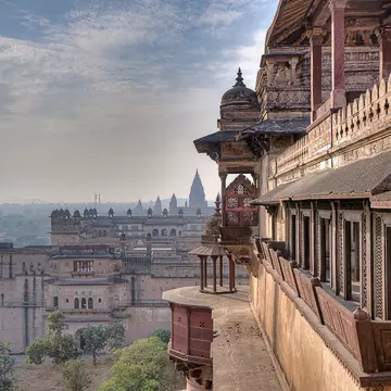 shutterstock_1266143704 Orchha Fort Rai Parveen Mahal ancient ruins and nature view in India.jpg