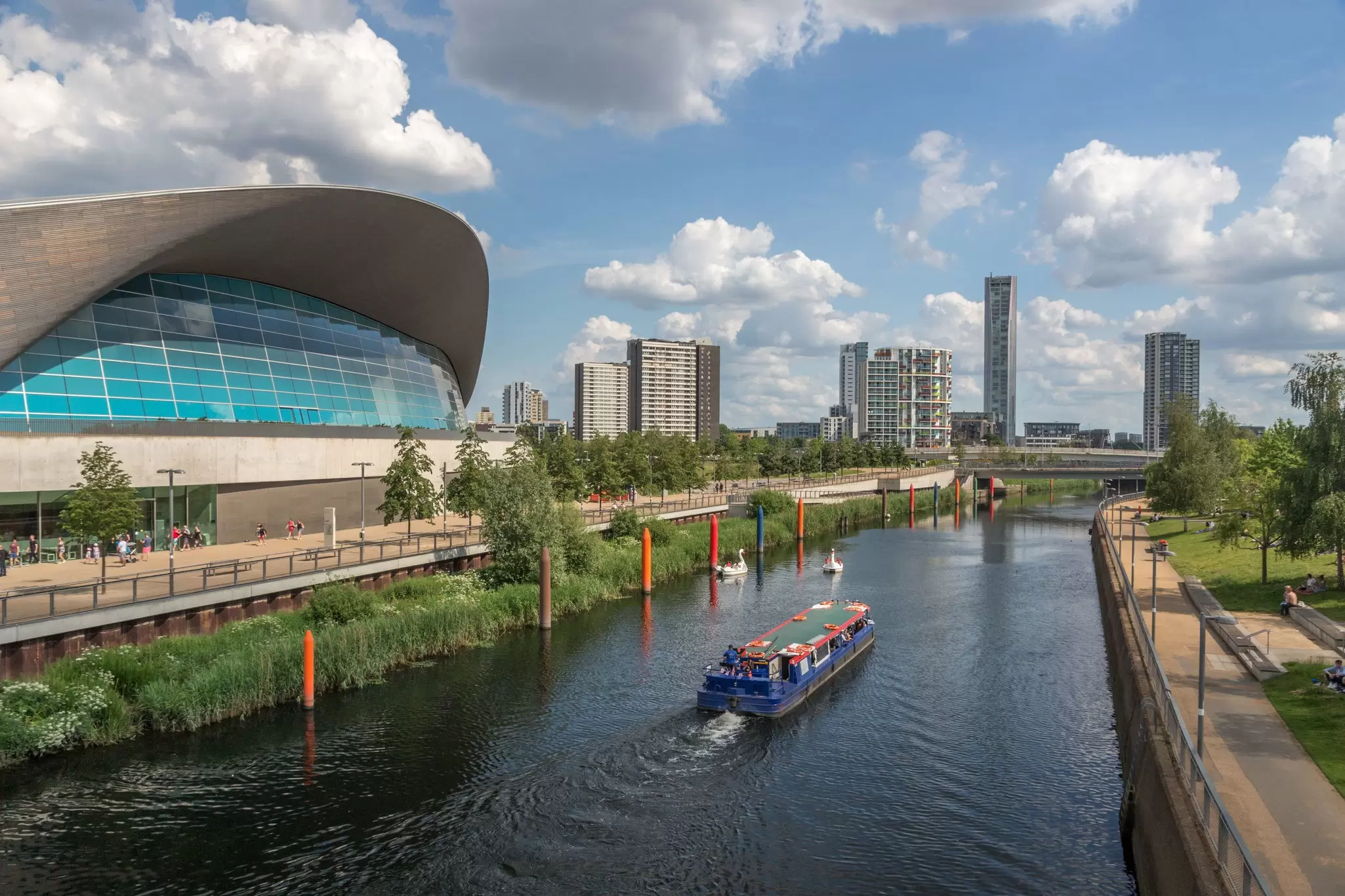 A boat travels along the River Lea at Queen Elizabeth Olympic Park in London, UK.