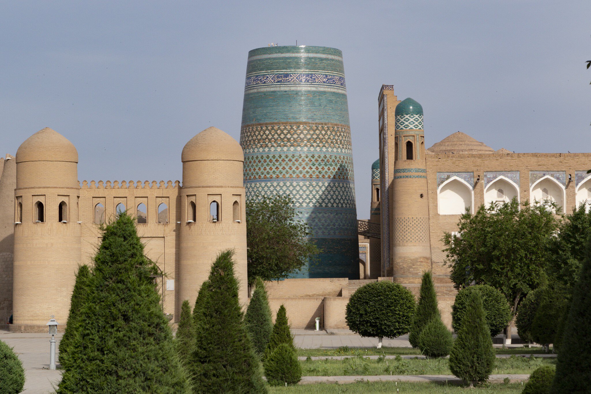 Kalta Minor minaret and city walls in Khiva, Uzbekistan, Central Asia