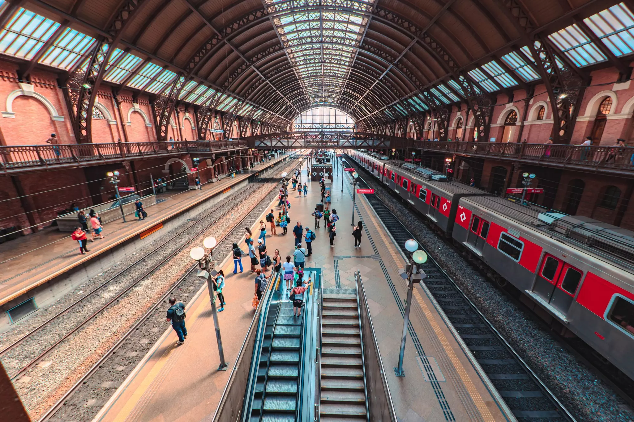 View down to a platform with passengers waiting at Estação da Luz, São Paulo, Brazil. Sept 7, 2022. Estação da Luz (Luz Station) is one of the most important railway stations in the city of São Paulo.