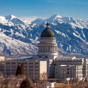 Utah State Capitol Building and the mountains of the Wasatch Range beyond, Salt Lake City, Utah, USA