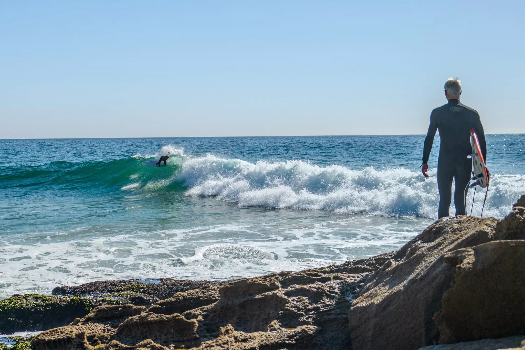 Surfer at beach in Taghazout